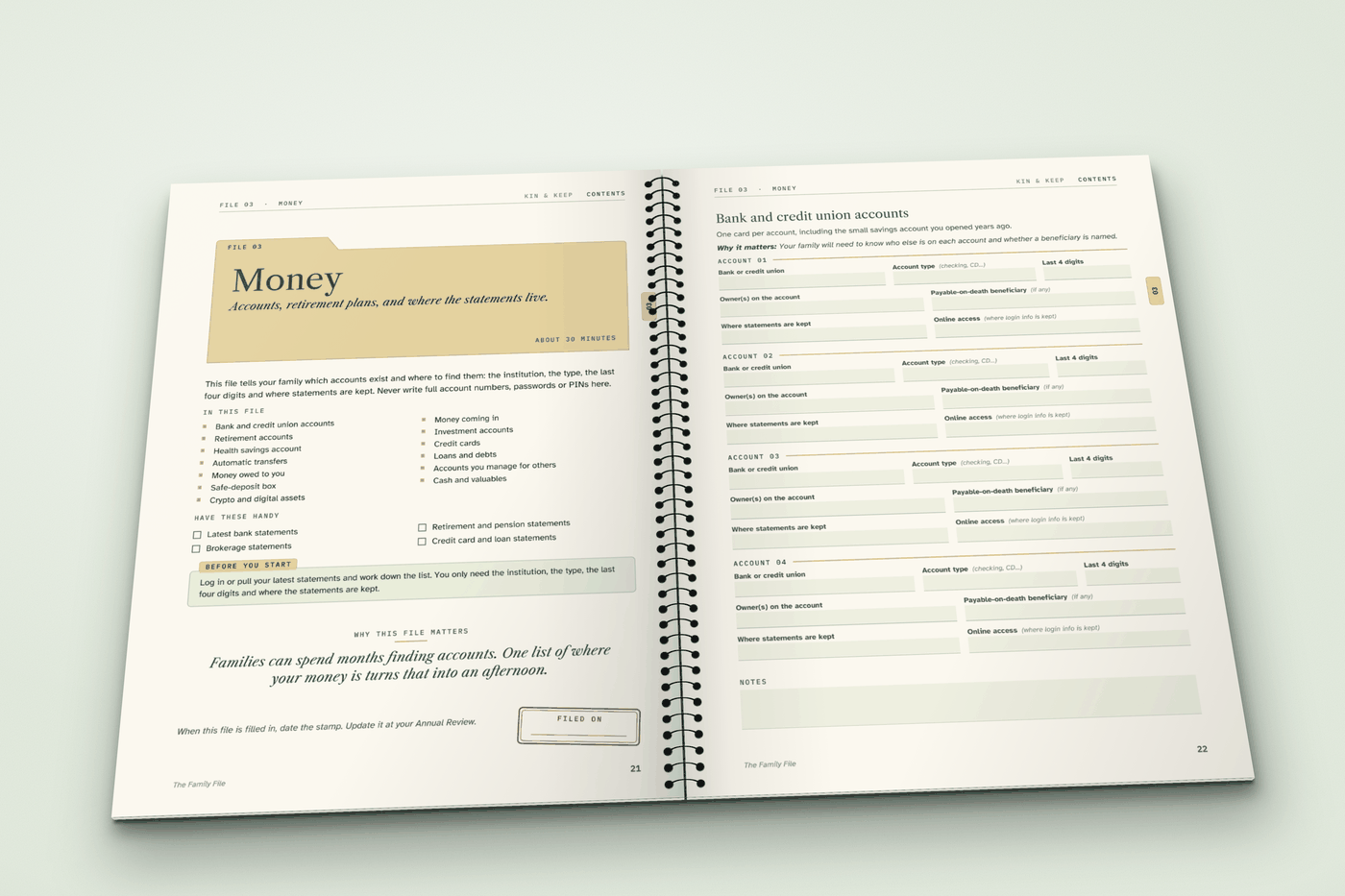 The Family File lying open to the divider page for File 03, Money, and a form page for bank accounts